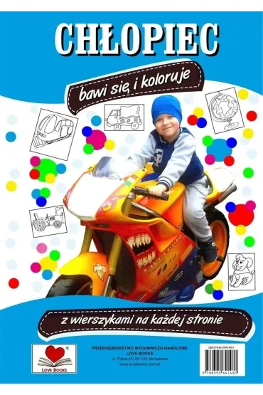 Chłopiec bawi się i koloruje