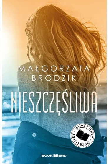 Nieszczęśliwa. Duże Litery