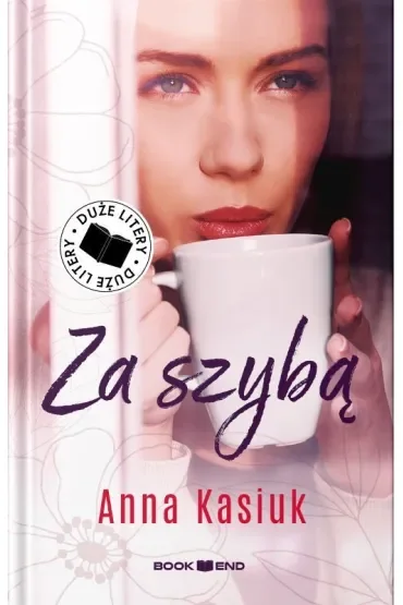 Za szybą. Duże litery