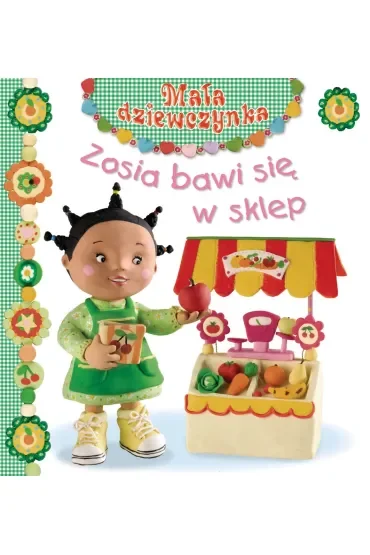 Zosia bawi się w sklep. Mała dziewczynka
